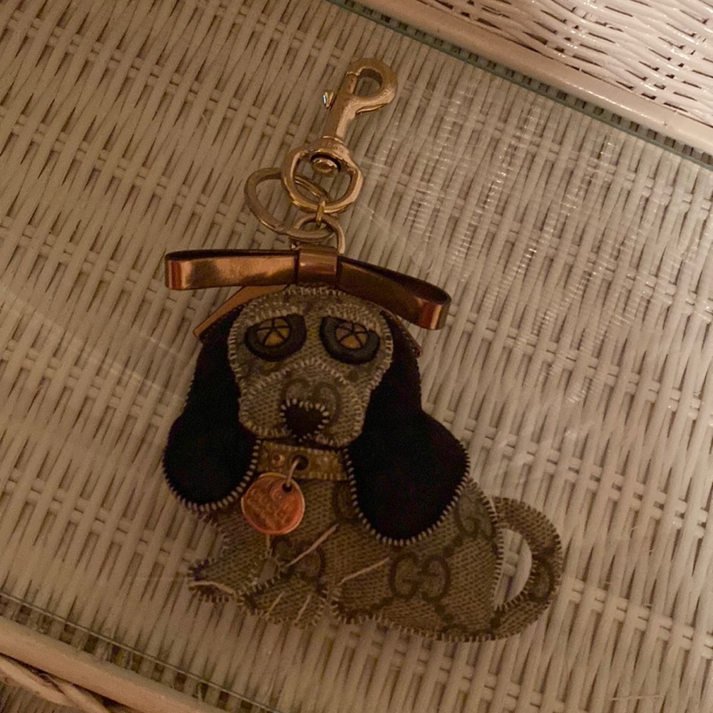 Gucci dog key chain.